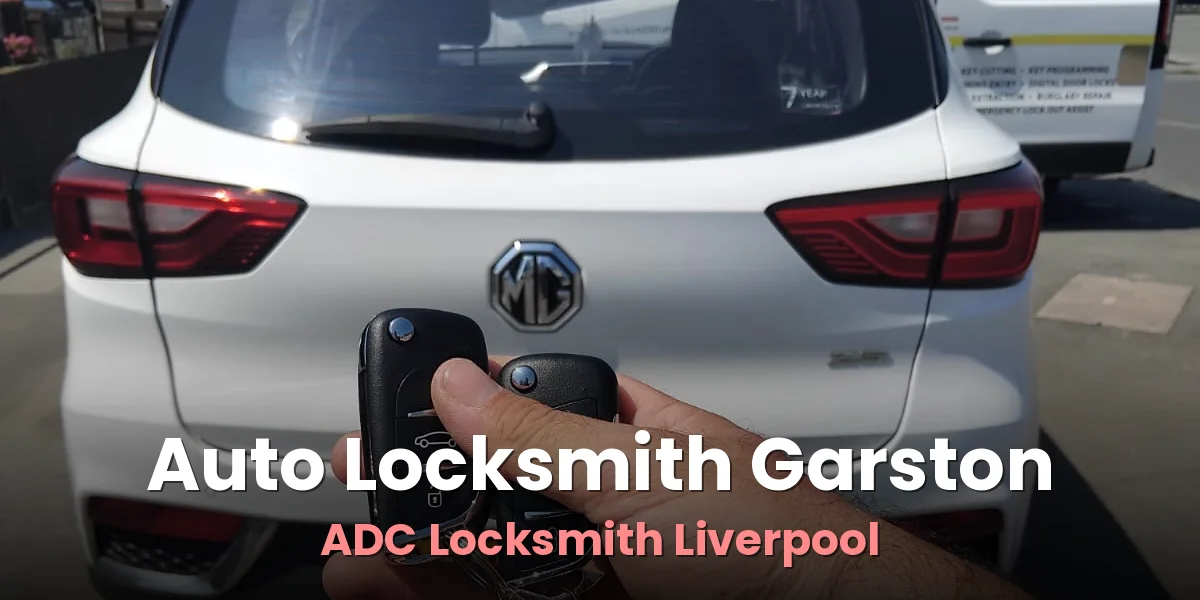 Replacement car key held beside the car after programming by ADC Locksmith