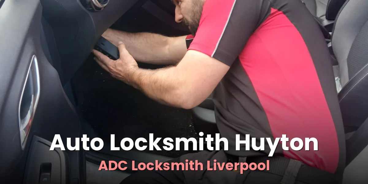 Craig Evans of ADC Locksmith working on a car key job at a customer vehicle