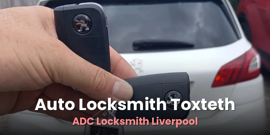 Flip key programmed by ADC Locksmith, held beside a white car after the job