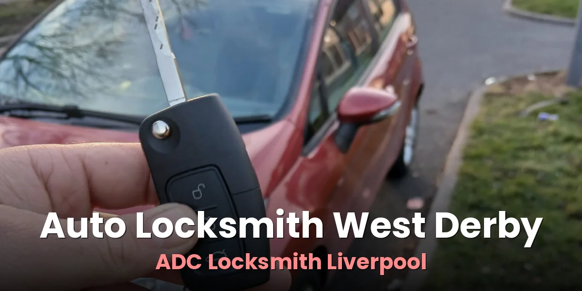 Programmed car key held beside a red car at the end of an ADC Locksmith job