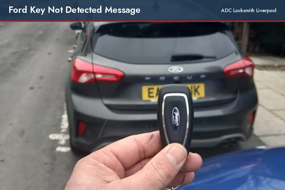 Ford key not detected message, Ford keyless fob held behind a grey Ford