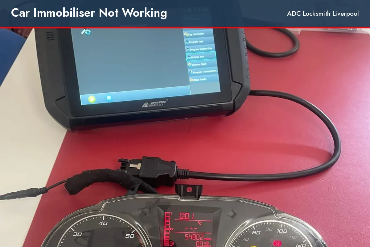 car immobiliser not working, diagnostic tool beside the instrument cluster