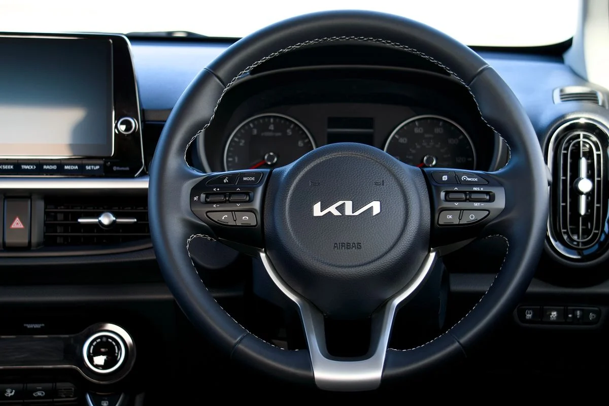 Kia steering wheel and dashboard