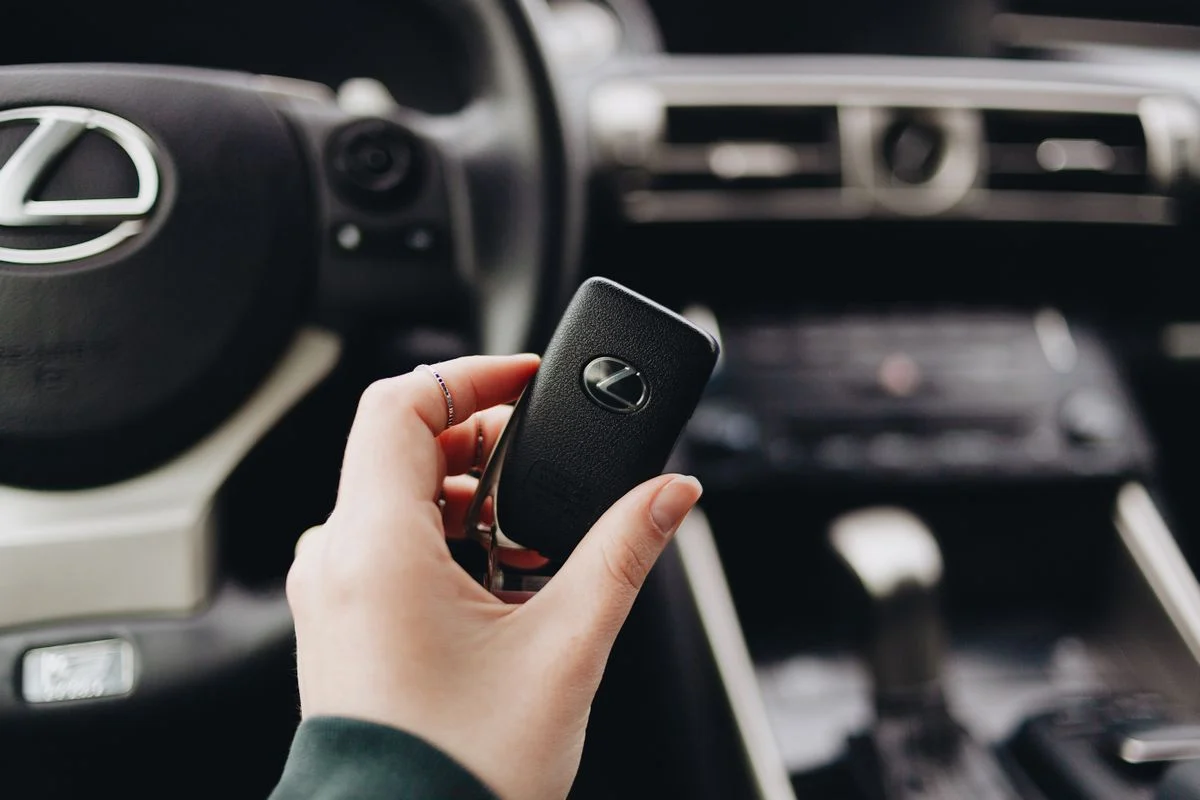 Lexus car key held inside the car