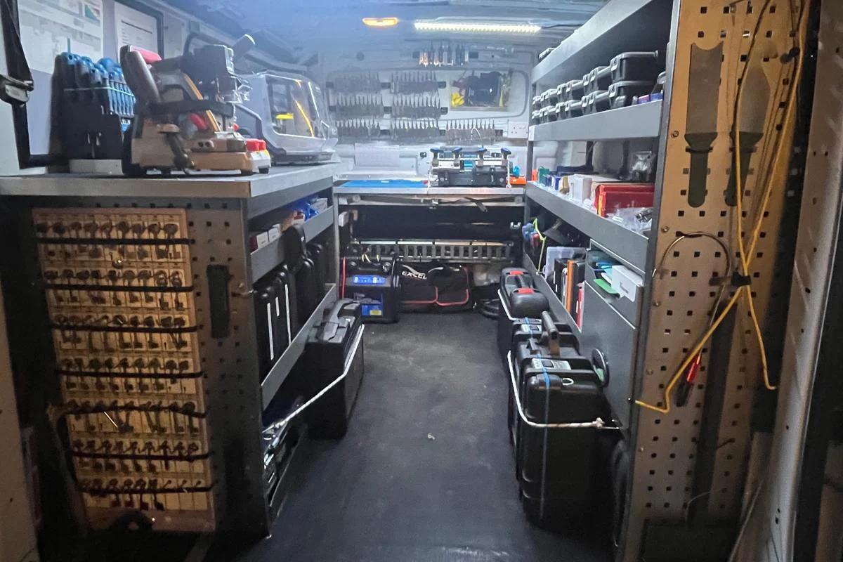 Key cutting and programming equipment inside the ADC Locksmith van